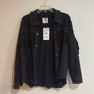 Women’s black Zara Jean jacket.